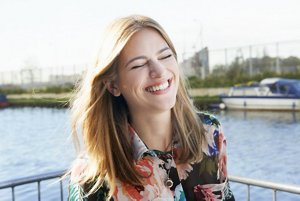 Beautiful young woman with long honey blonde hair